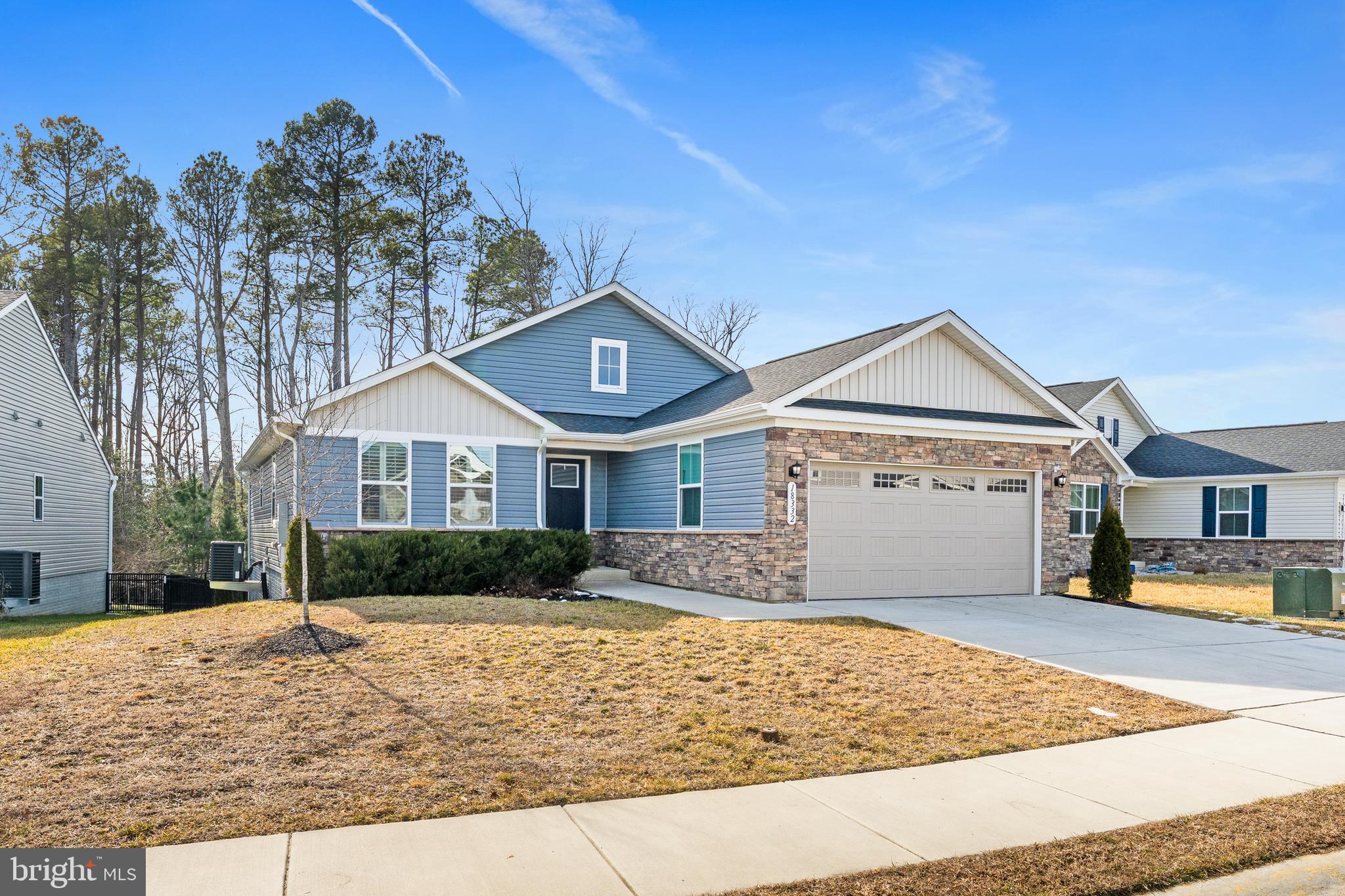 18332 Signature Way Ruther Glen, VA 22546 - Photo 44 of 50 a front view of a house with a yard