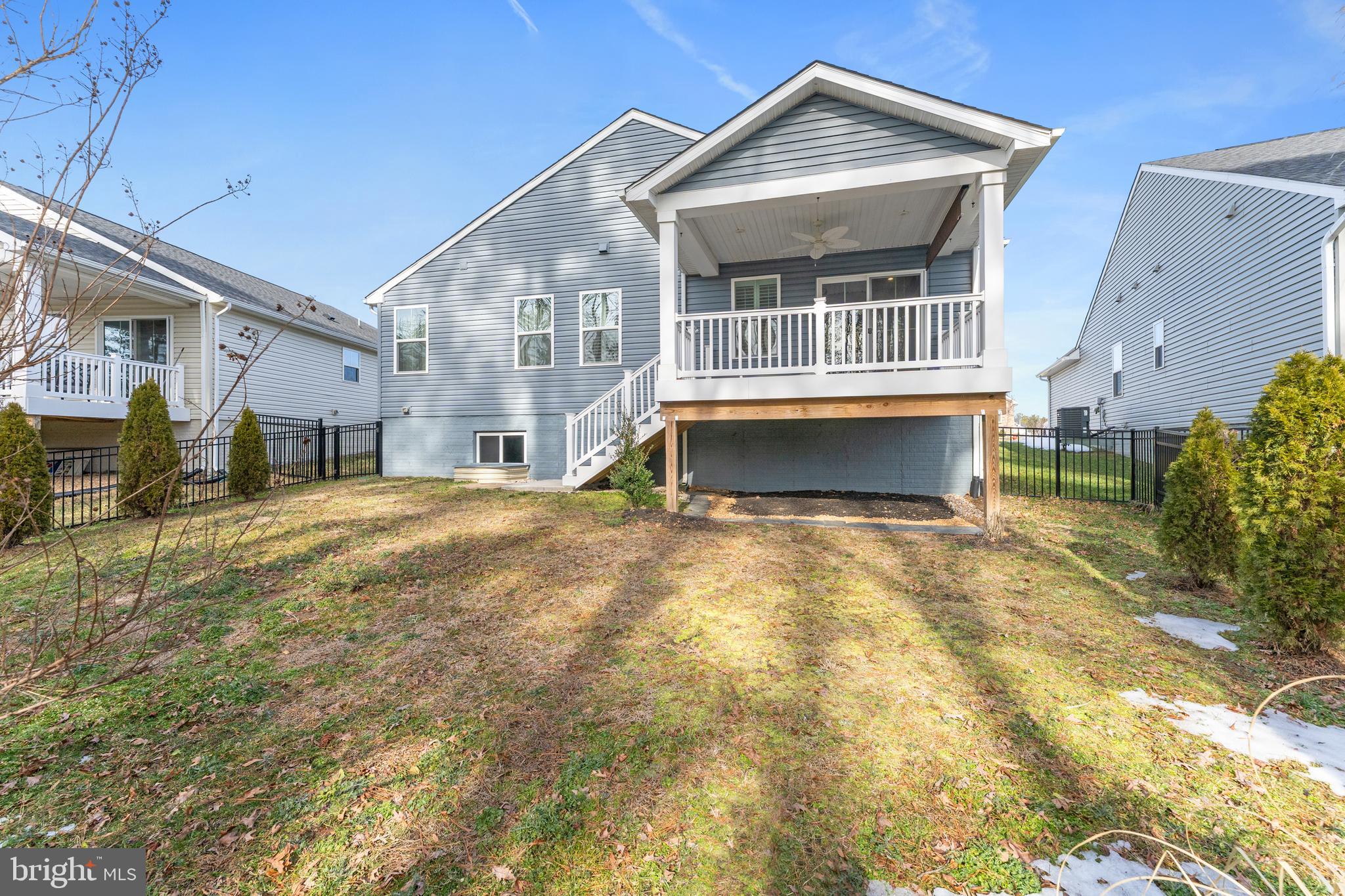18332 Signature Way Ruther Glen, VA 22546 - Photo 49 of 50 a front view of a house with a yard
