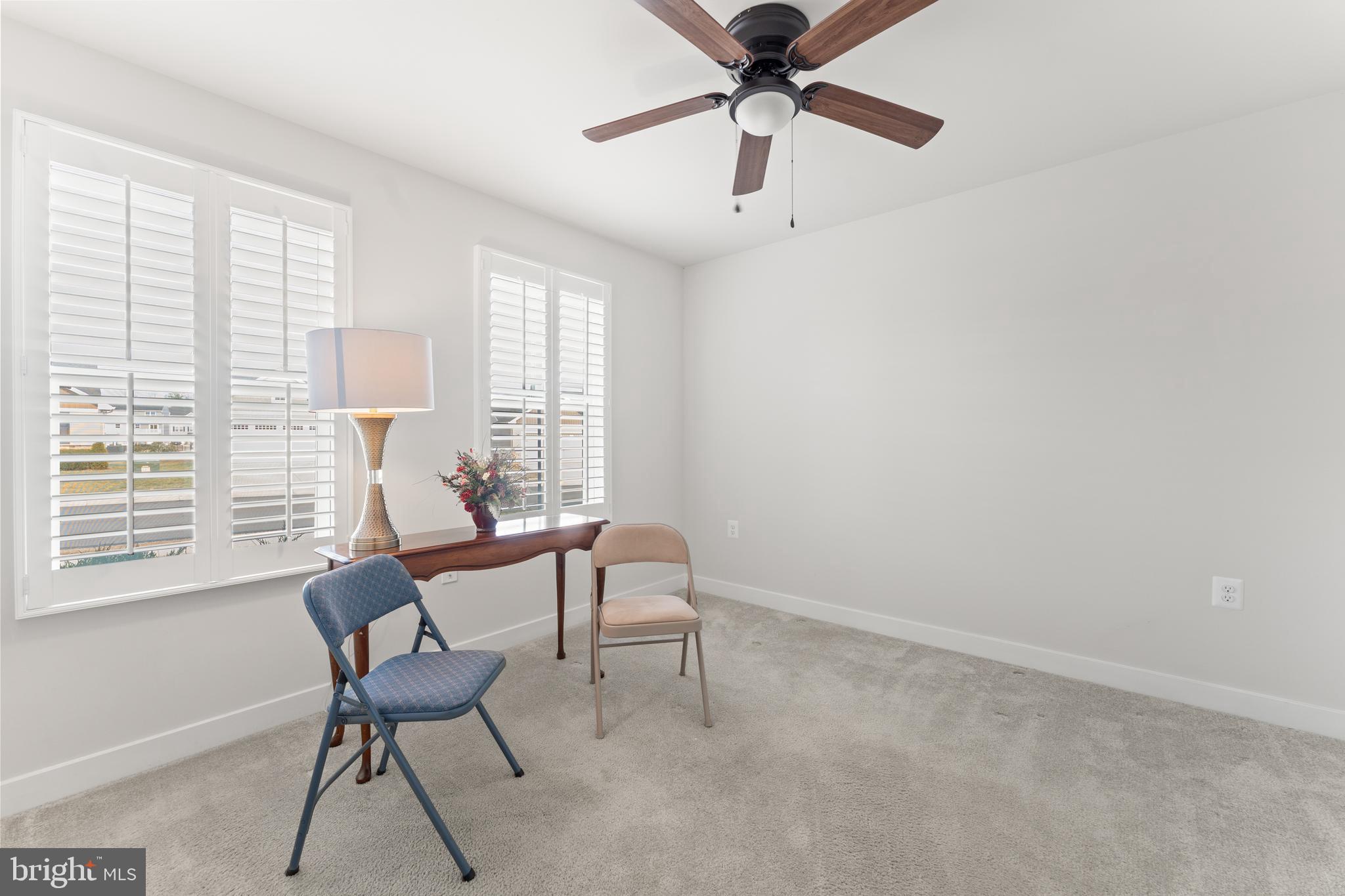18332 Signature Way Ruther Glen, VA 22546 - Photo 10 of 50 a dining room with furniture and window