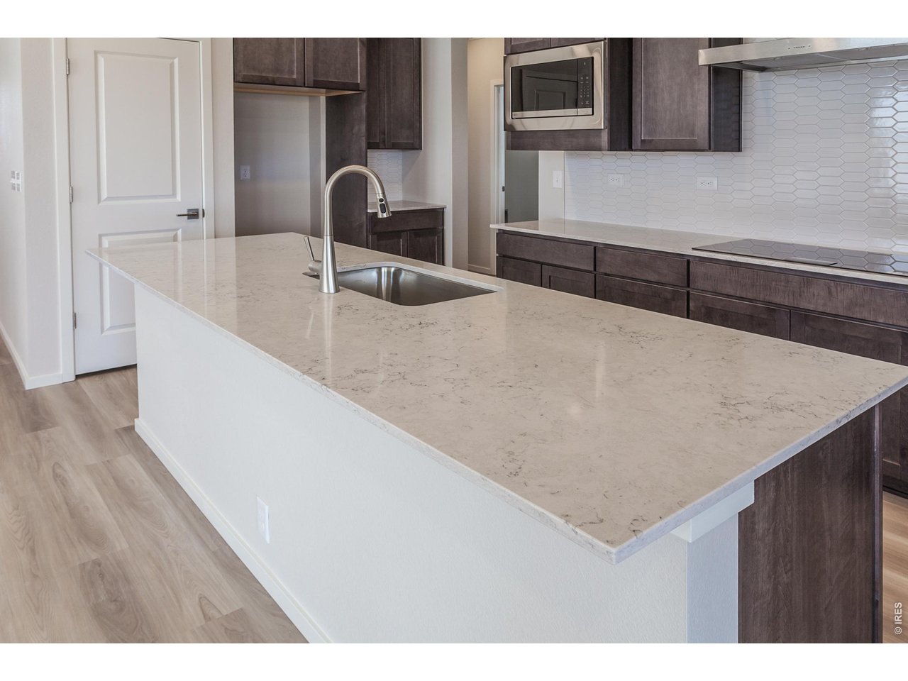 792 Chatter Road Windsor, CO 80550 - Photo 22 of 49 a close view of sink and tap