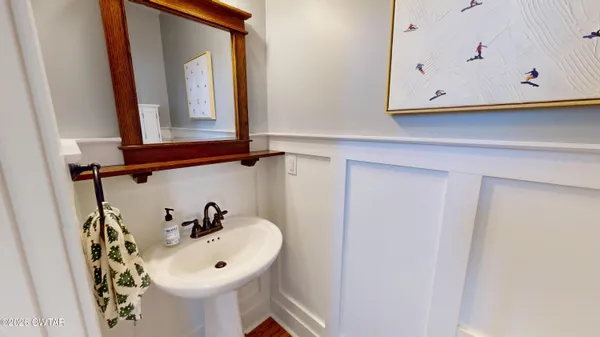 a bathroom with a toilet and a sink