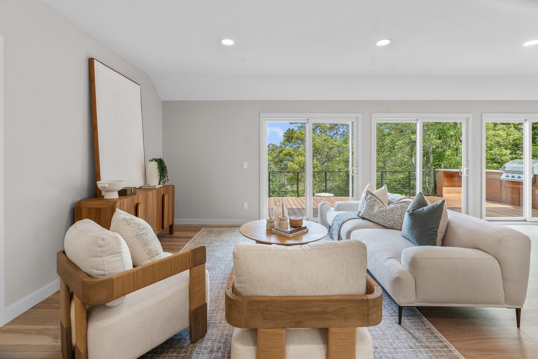 162 Main Street Osterville, MA 02655 - Photo 6 of 50 a living room with furniture and a large window