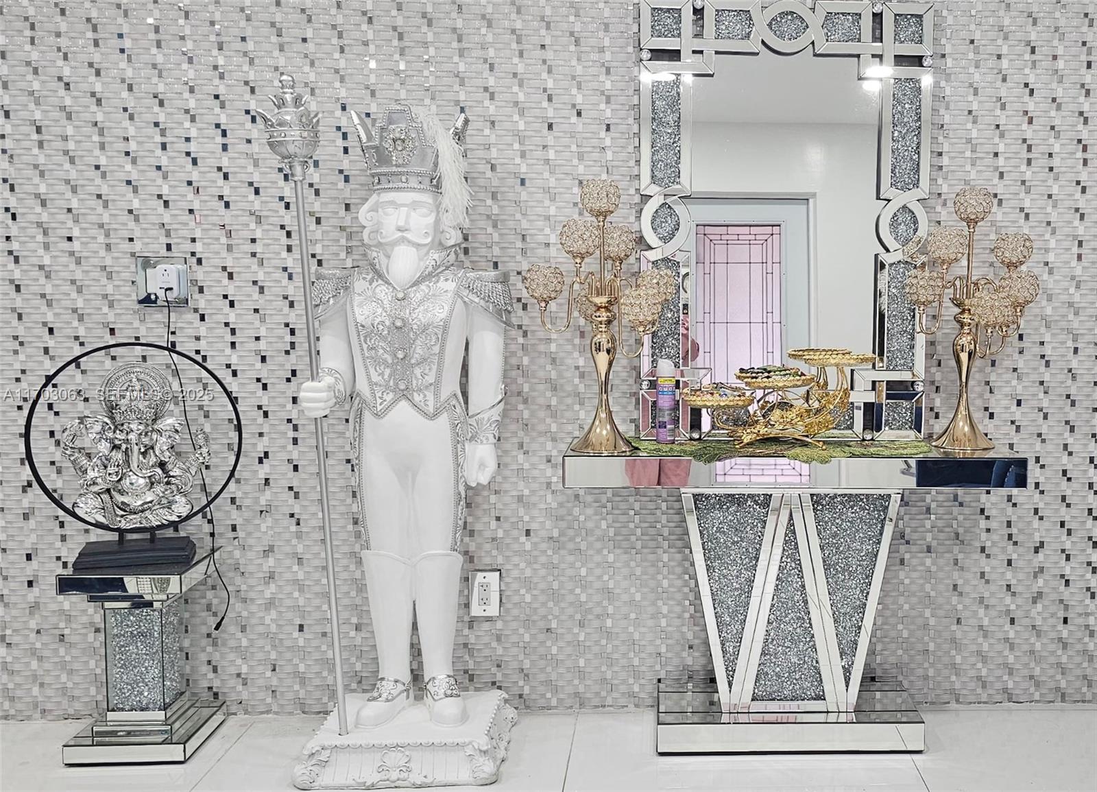 15700 Southwest 202nd Avenue Miami, FL 33187 - Photo 12 of 16 a bathroom with a sink and a mirror