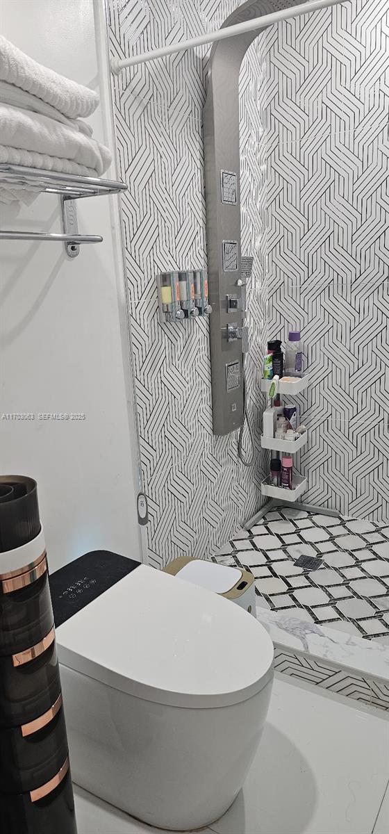 15700 Southwest 202nd Avenue Miami, FL 33187 - Photo 13 of 16 a bathroom with a sink and a mirror