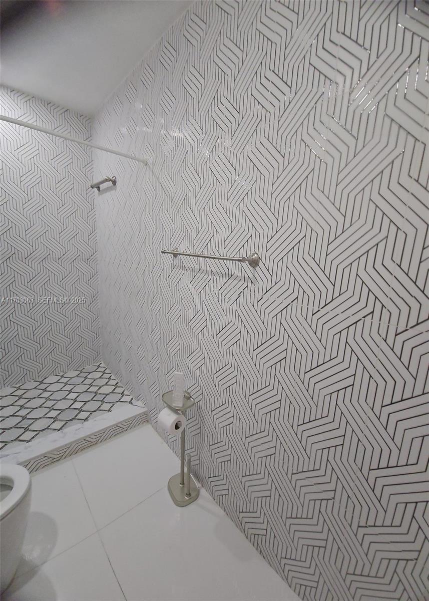 15700 Southwest 202nd Avenue Miami, FL 33187 - Photo 16 of 16 a bathroom with a sink