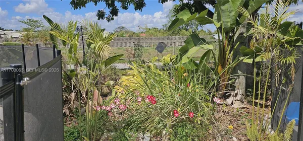 a view of balcony with wooden floor