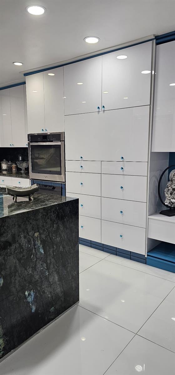 15700 Southwest 202nd Avenue Miami, FL 33187 - Photo 6 of 16 a view of an empty room with wooden floor