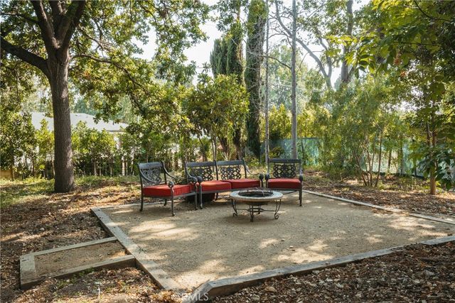 a view of a backyard of a house
