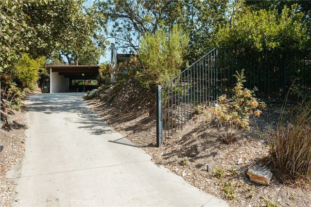 an empty room with wooden floor
