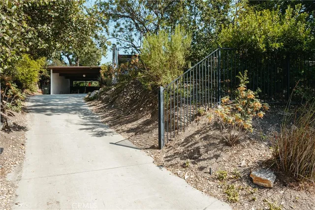 an empty room with wooden floor