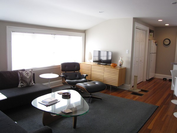 19 Appleby Road Wellesley, MA 02482 - Photo 11 of 18 a living room with furniture and a large window
