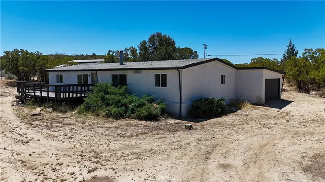 a house view with a outdoor space