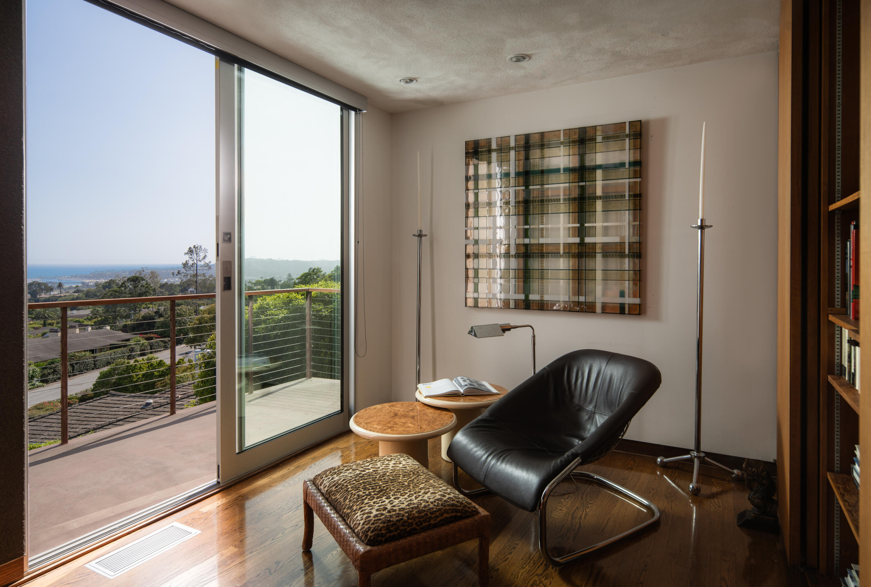 1944 Eucalyptus Hill Road Santa Barbara, CA 93108 - Photo 14 of 38 a living room with furniture and a floor to ceiling window