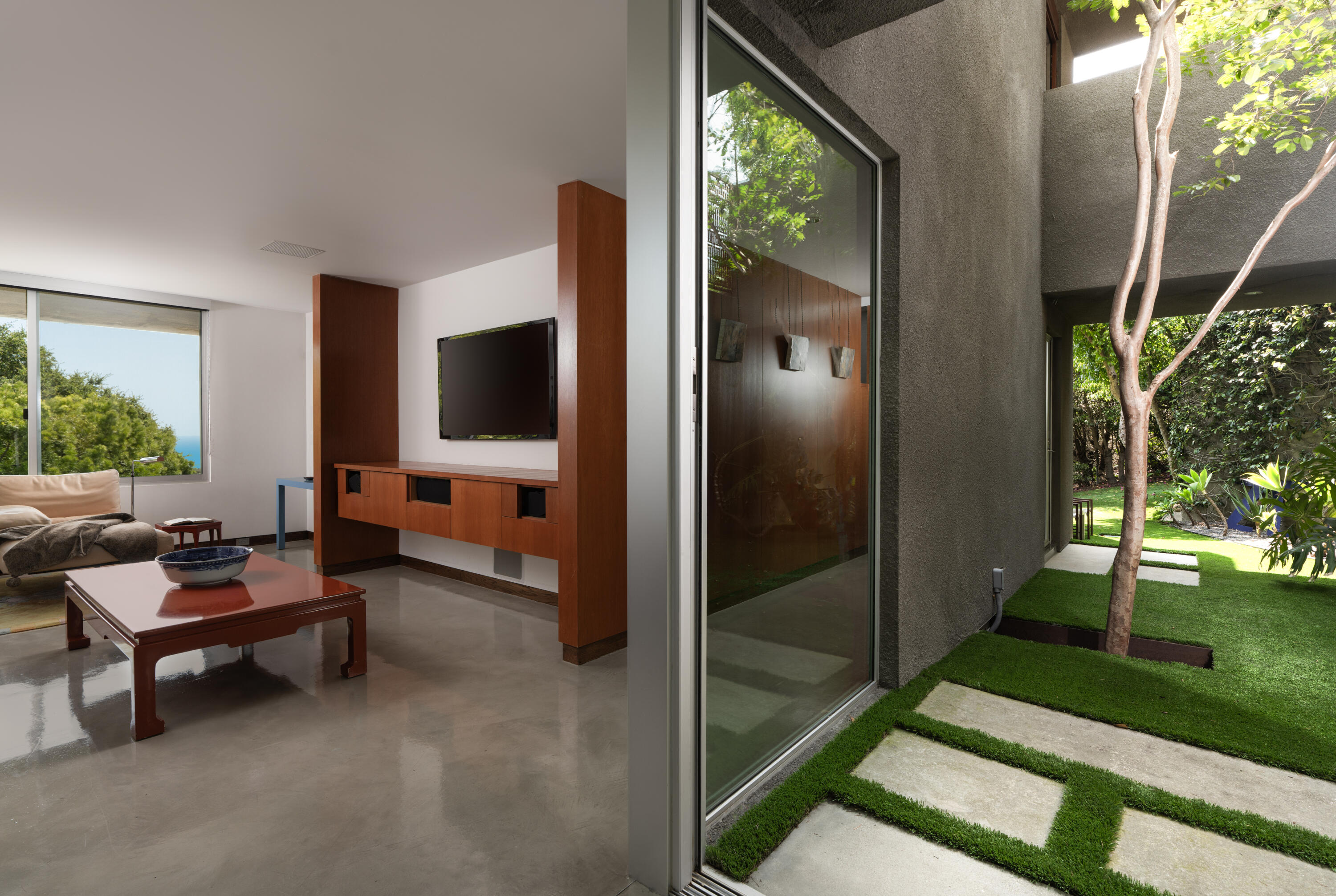 1944 Eucalyptus Hill Road Santa Barbara, CA 93108 - Photo 21 of 38 a living room with patio