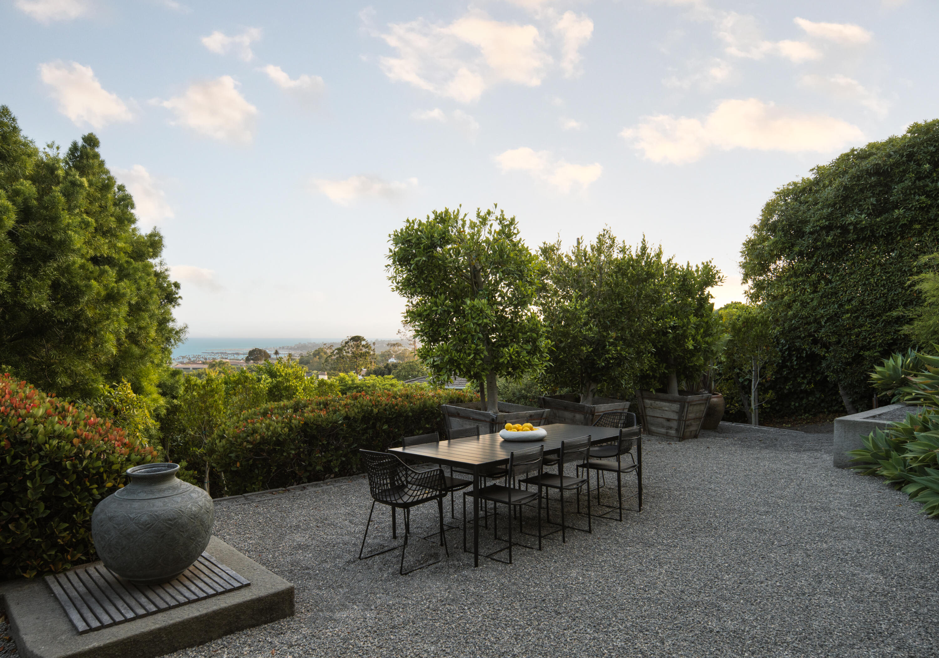 1944 Eucalyptus Hill Road Santa Barbara, CA 93108 - Photo 30 of 38 a view of a backyard with furniture and a garden