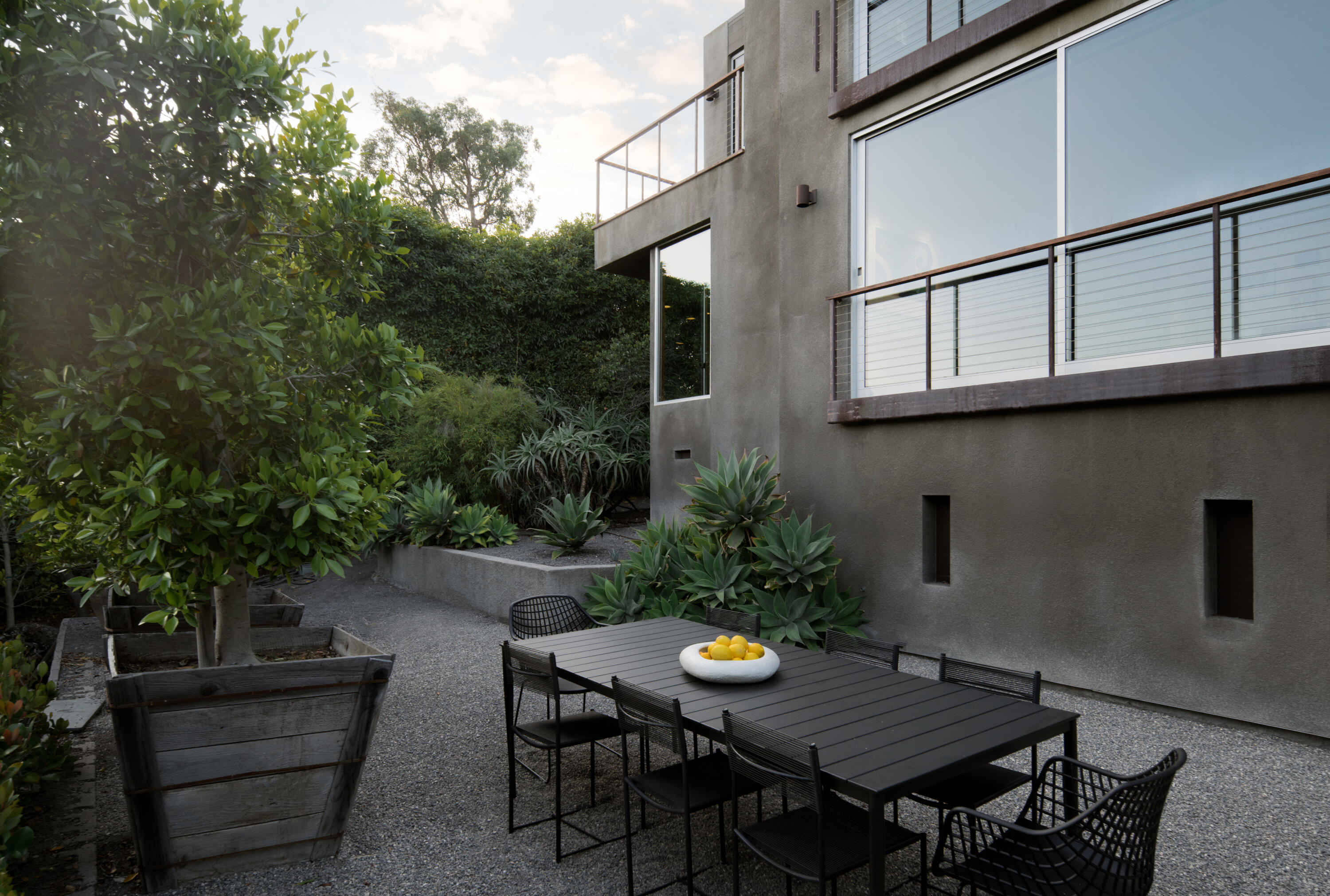 1944 Eucalyptus Hill Road Santa Barbara, CA 93108 - Photo 31 of 38 a view of a dinning tables and chairs in a patio