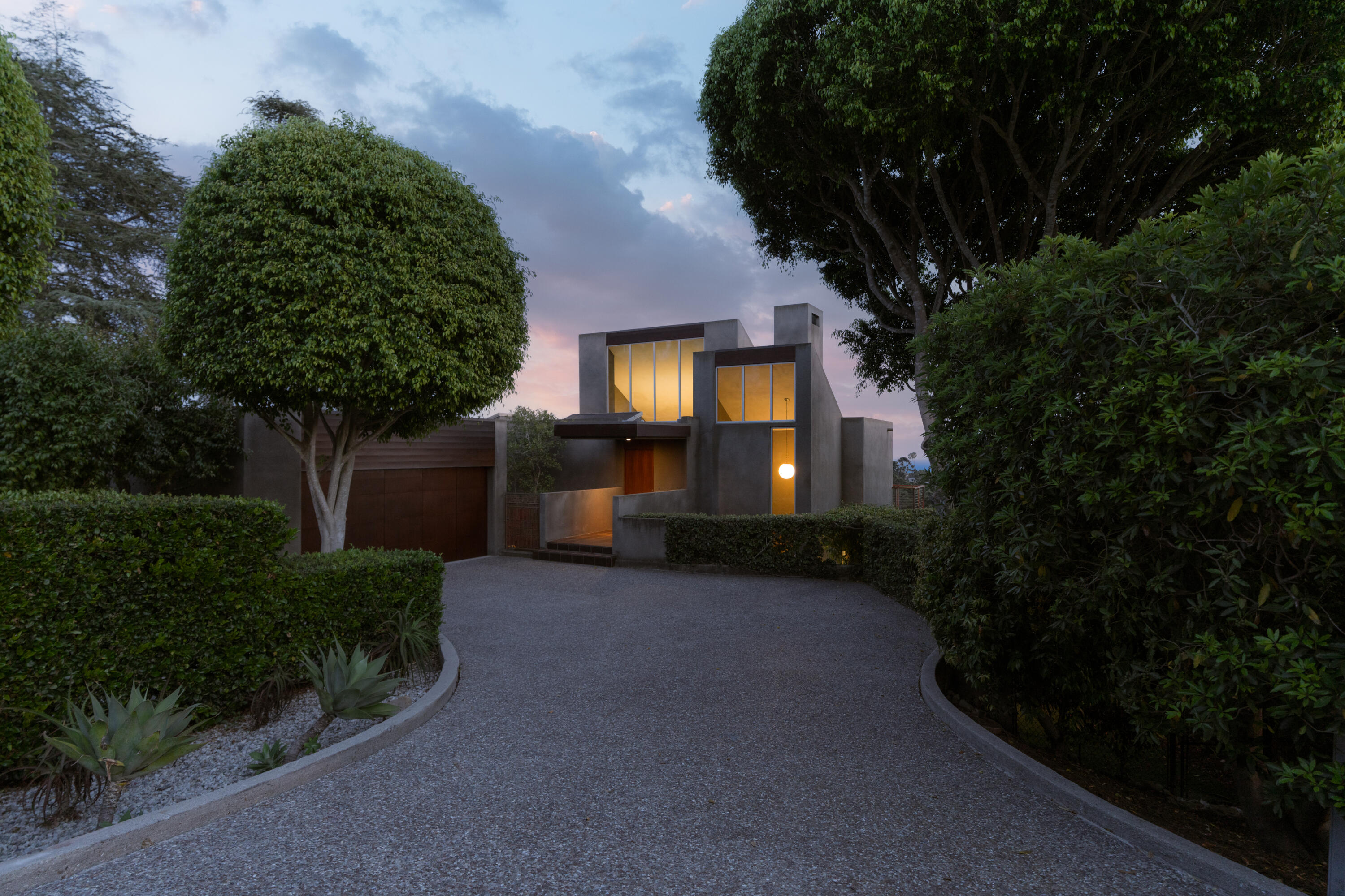 1944 Eucalyptus Hill Road Santa Barbara, CA 93108 - Photo 38 of 38 a front view of a house with a yard