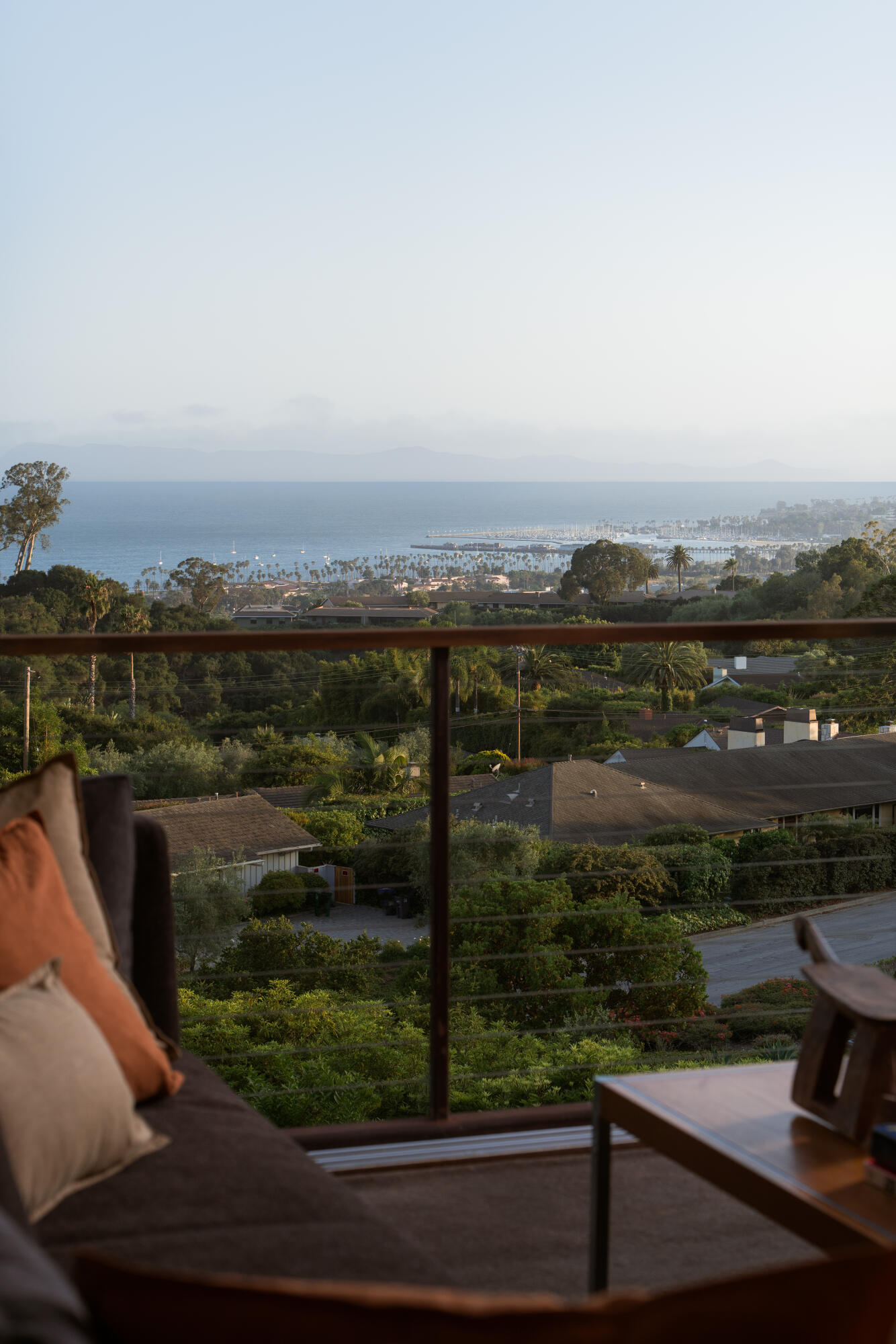 1944 Eucalyptus Hill Road Santa Barbara, CA 93108 - Photo 4 of 38 a view of a city from a balcony