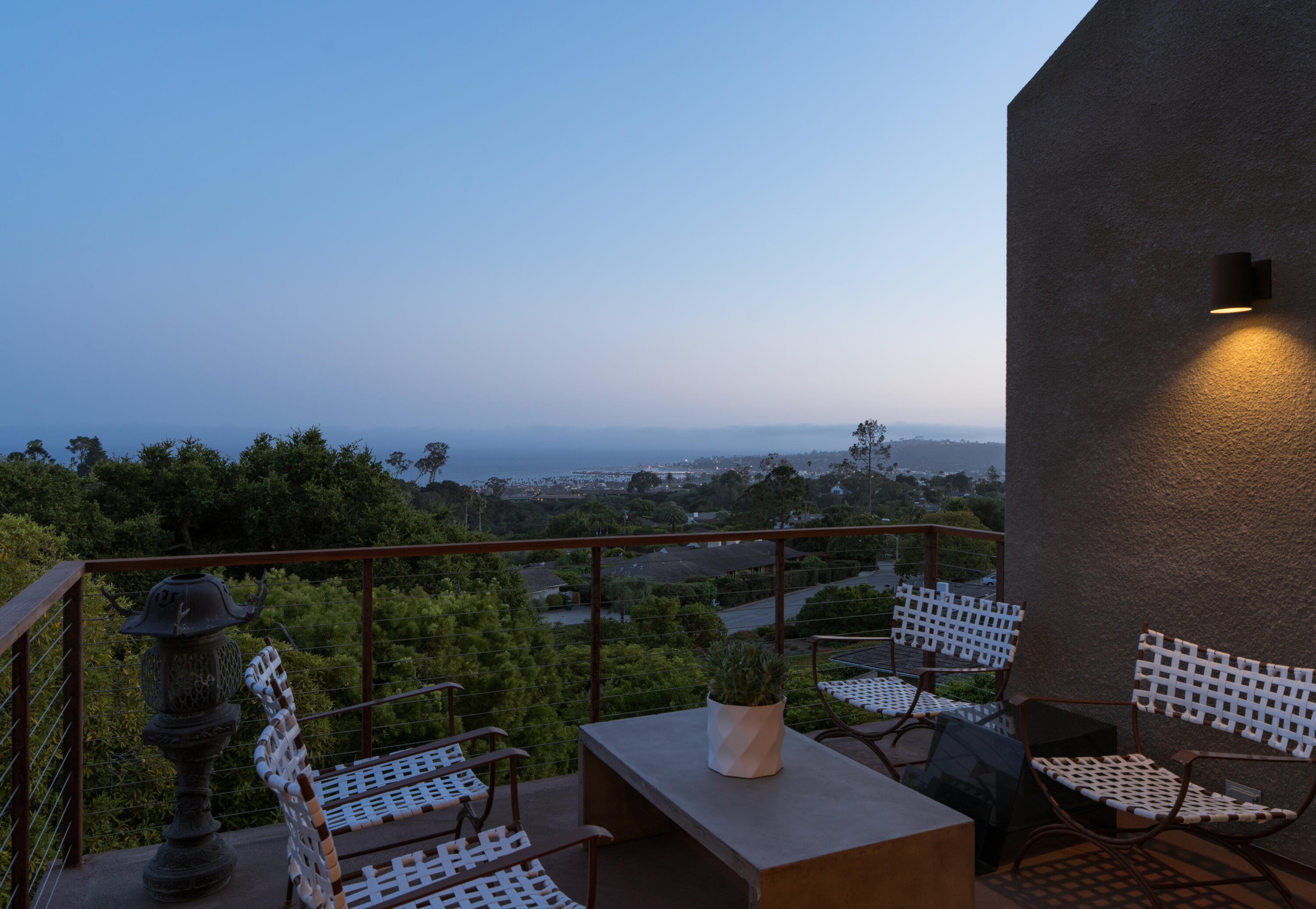 1944 Eucalyptus Hill Road Santa Barbara, CA 93108 - Photo 6 of 38 a view of a roof deck with couches and potted plants