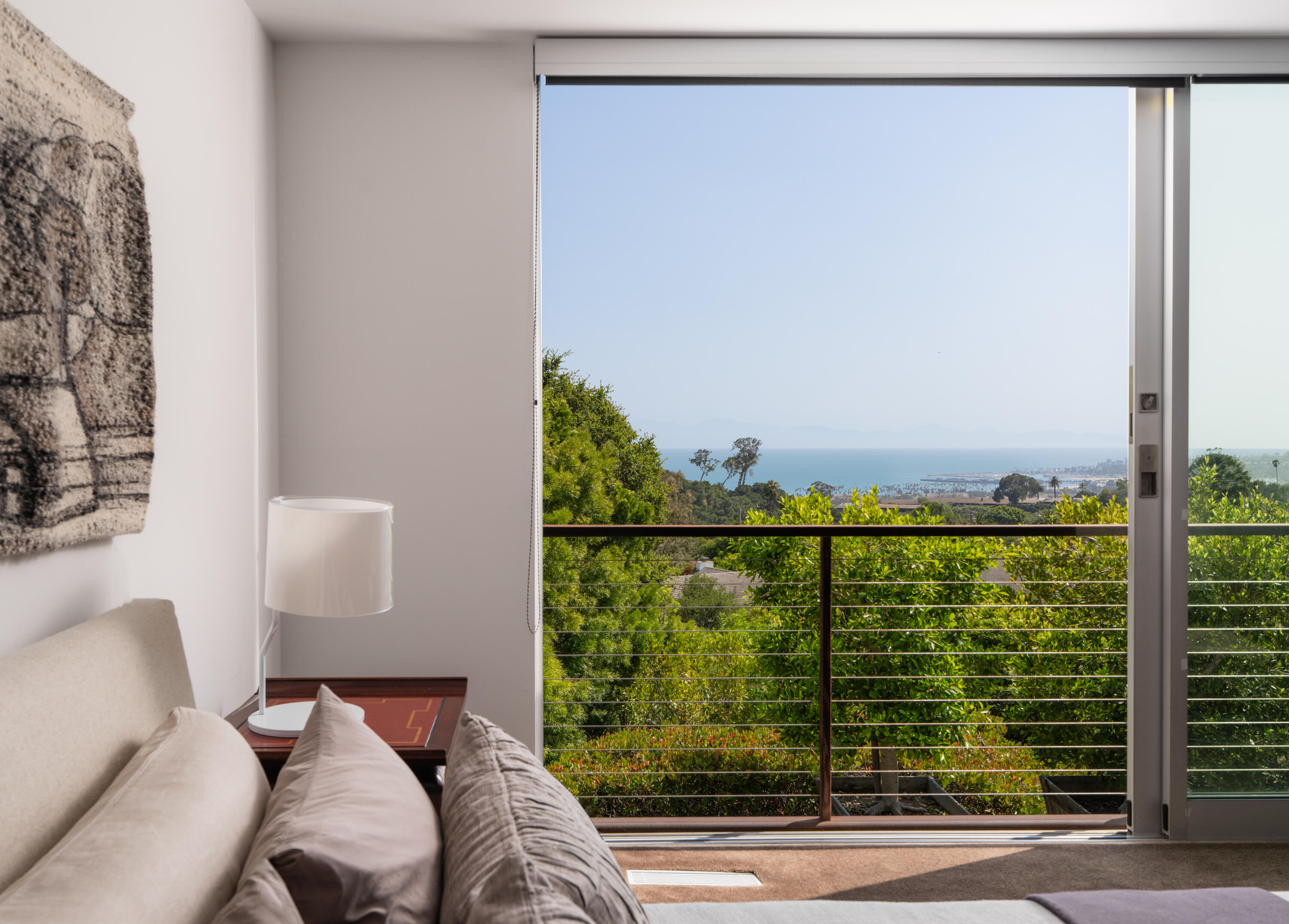 1944 Eucalyptus Hill Road Santa Barbara, CA 93108 - Photo 8 of 38 a view of a glass door and chair