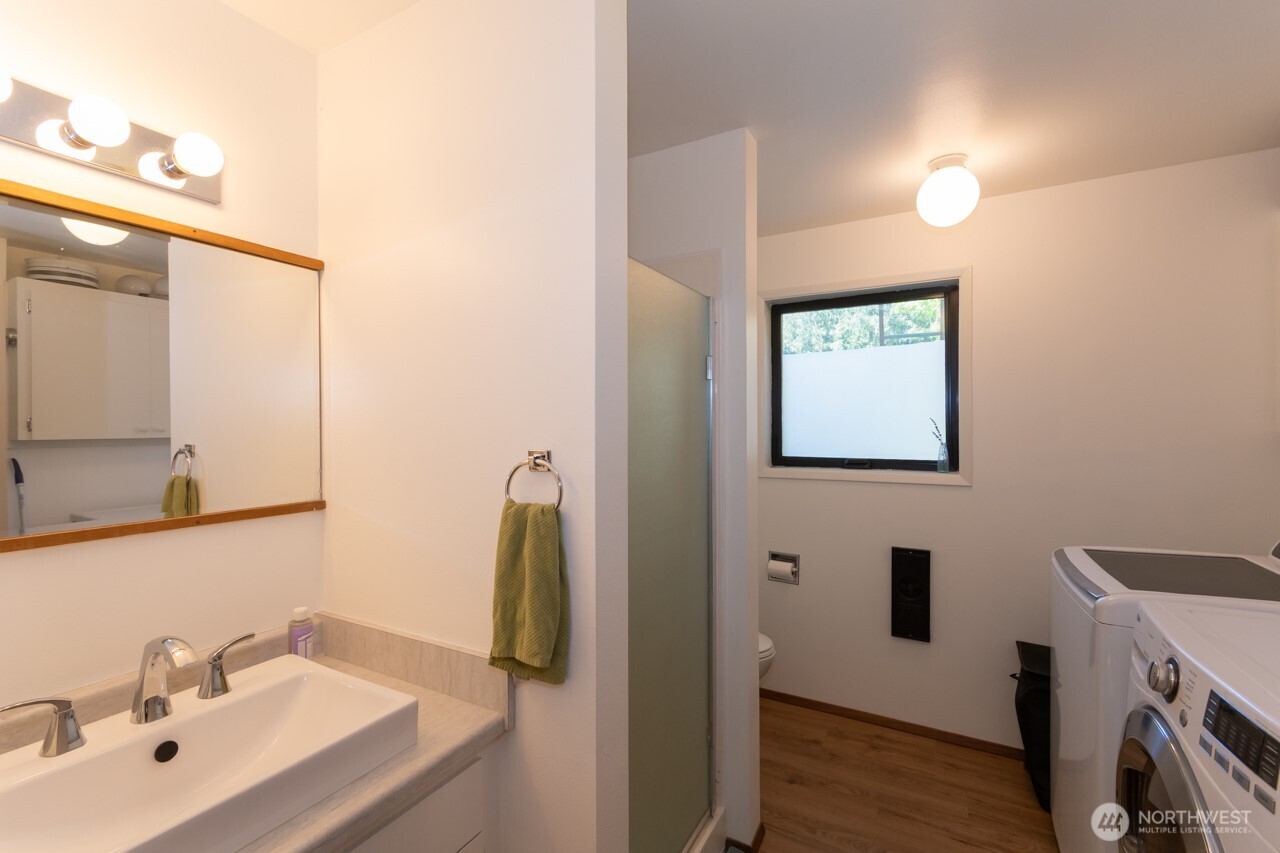 63 East Arnette Road Port Angeles, WA 98362 - Photo 31 of 40 a bathroom with a sink and mirror