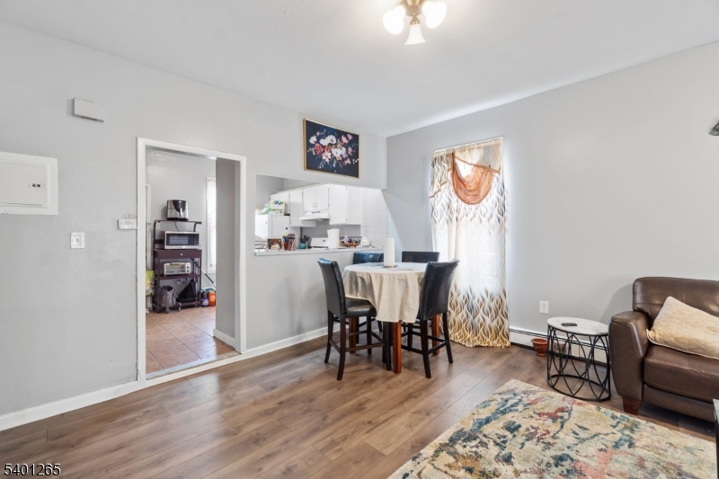 295 South 7th Street Newark, NJ 07103 - Photo 14 of 14 a dining room with furniture and wooden floor