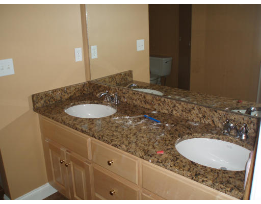 12 Collins Road Berlin, MA 01503 - Photo 11 of 14 a bathroom with a sink and a mirror