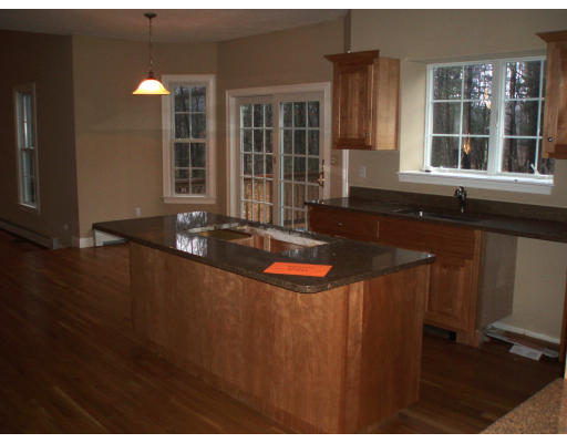 12 Collins Road Berlin, MA 01503 - Photo 4 of 14 a front view of a house with swimming pool