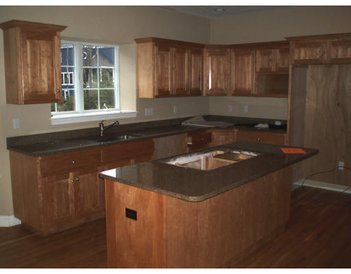 12 Collins Road Berlin, MA 01503 - Photo 5 of 14 a view of a sink and dishwasher in a kitchen