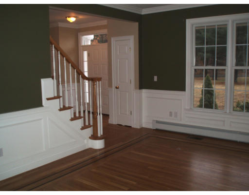 12 Collins Road Berlin, MA 01503 - Photo 7 of 14 a view of entryway and hall with wooden floor
