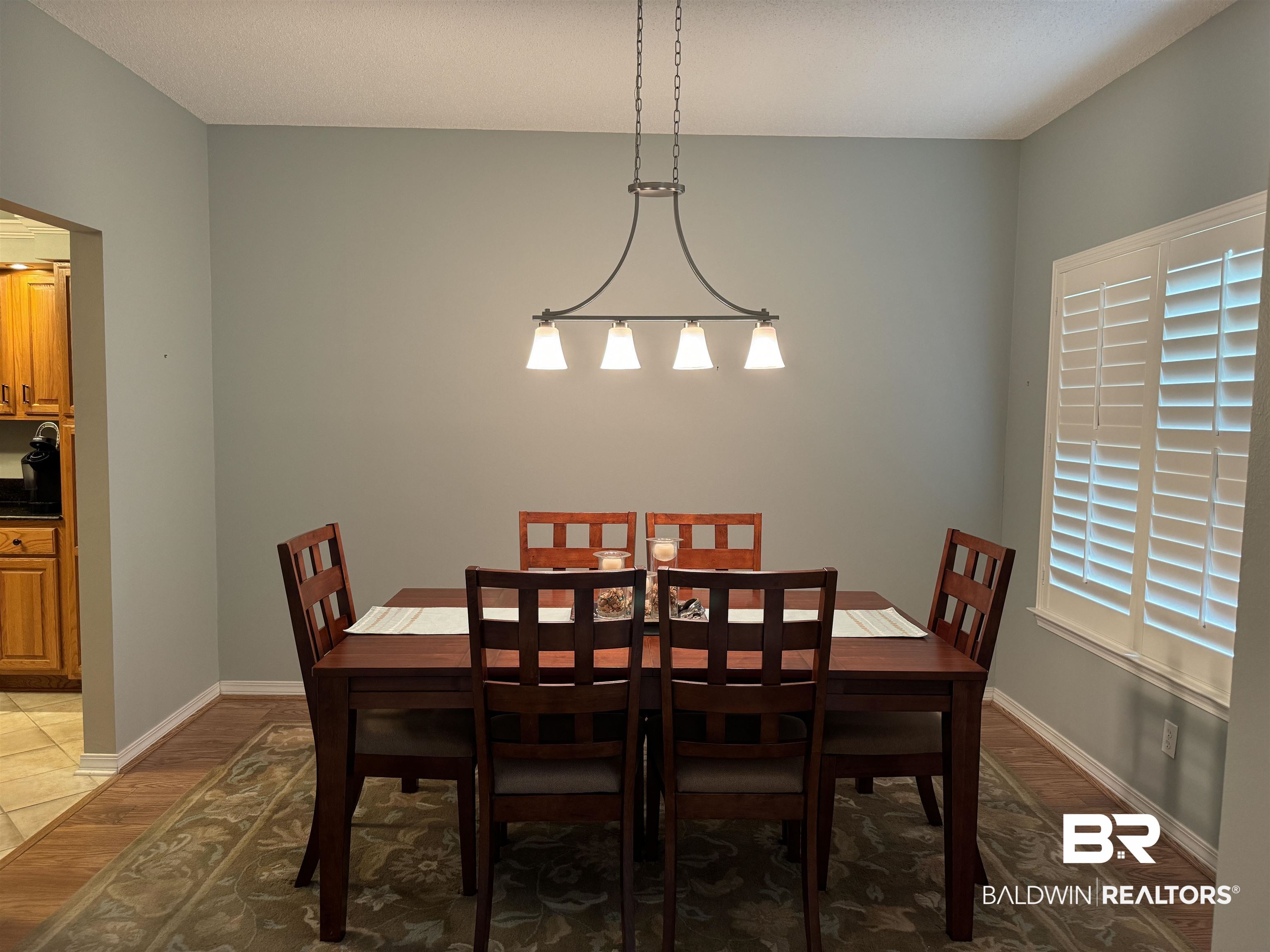 9139 Clubhouse Drive Foley, AL 36535 - Photo 8 of 30 Dining room with hardwood / wood-style flooring and a wealth of natural light