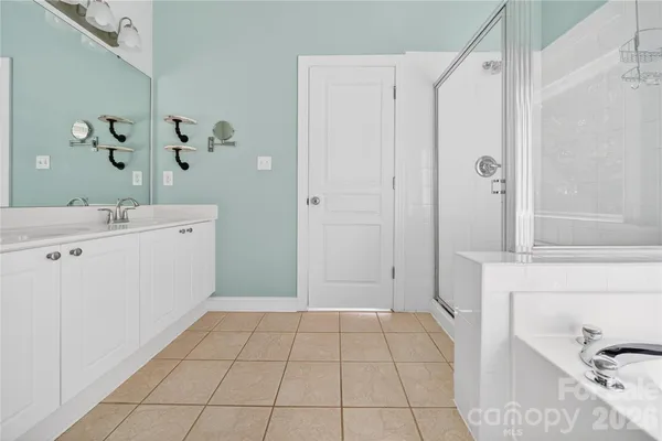 an aerial view of residential house with outdoor space and swimming pool