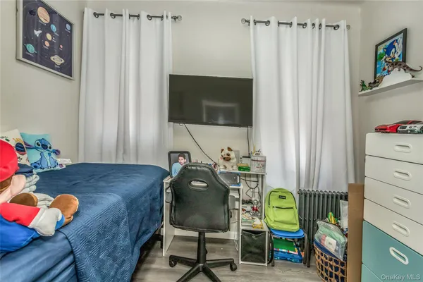 a workspace with furniture and a gate