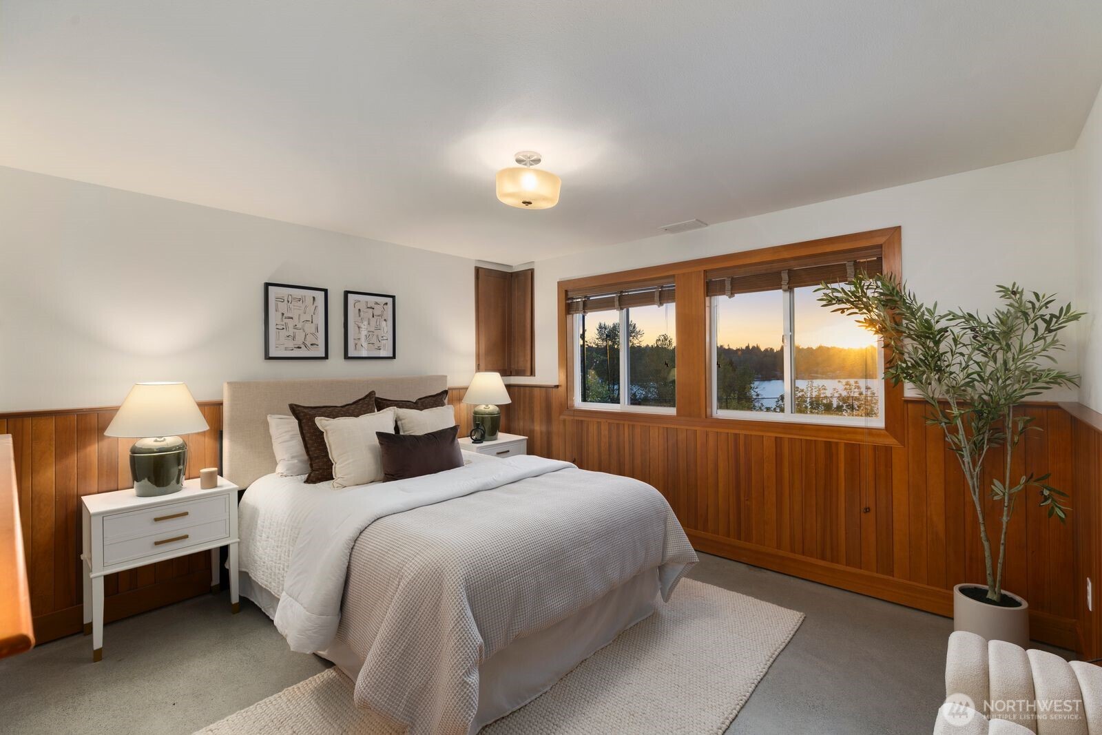 702 Rhodora Heights Road Lake Stevens, WA 98258 - Photo 31 of 40 a bedroom with a large bed and a window