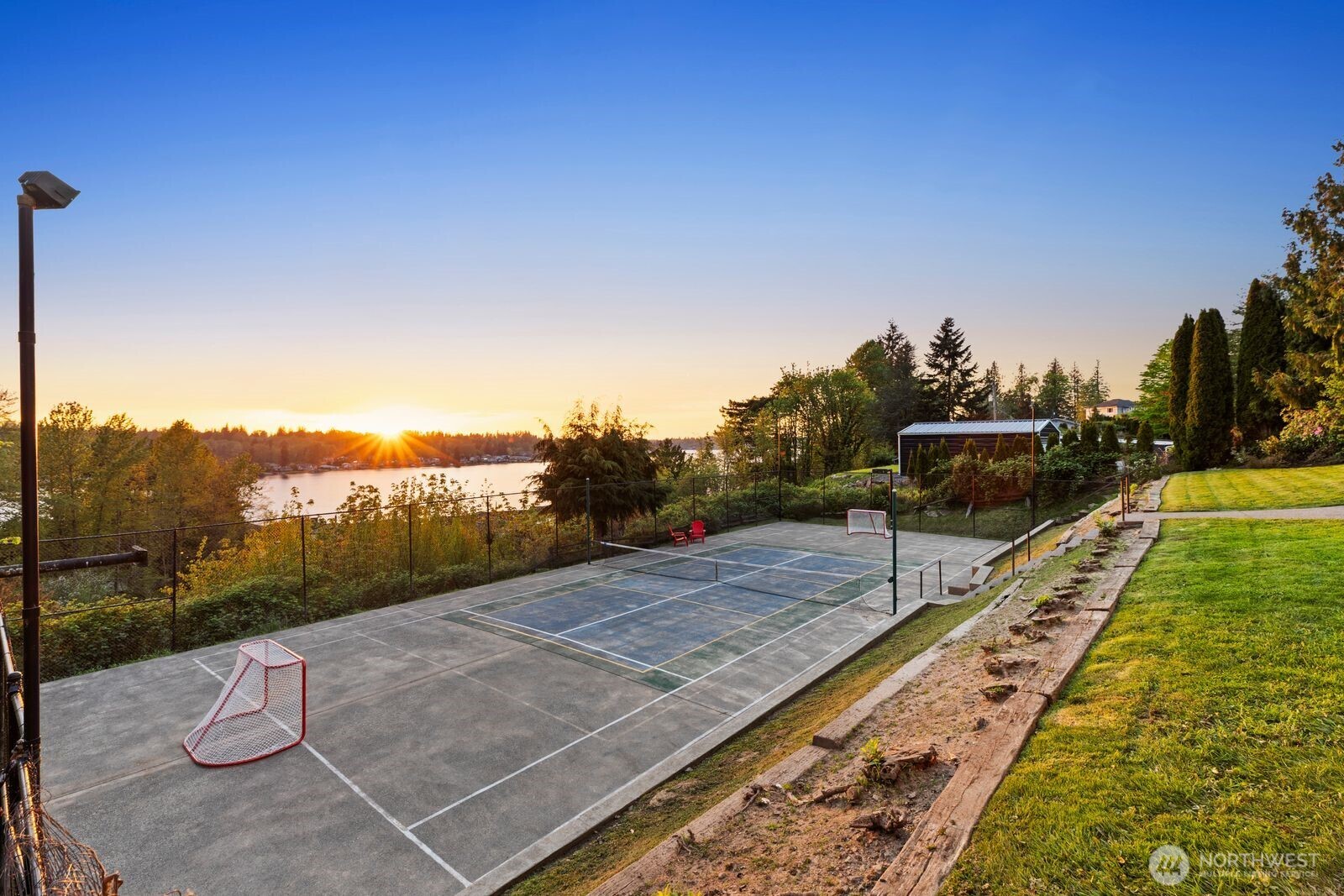702 Rhodora Heights Road Lake Stevens, WA 98258 - Photo 37 of 40 a view of a swimming pool with a patio