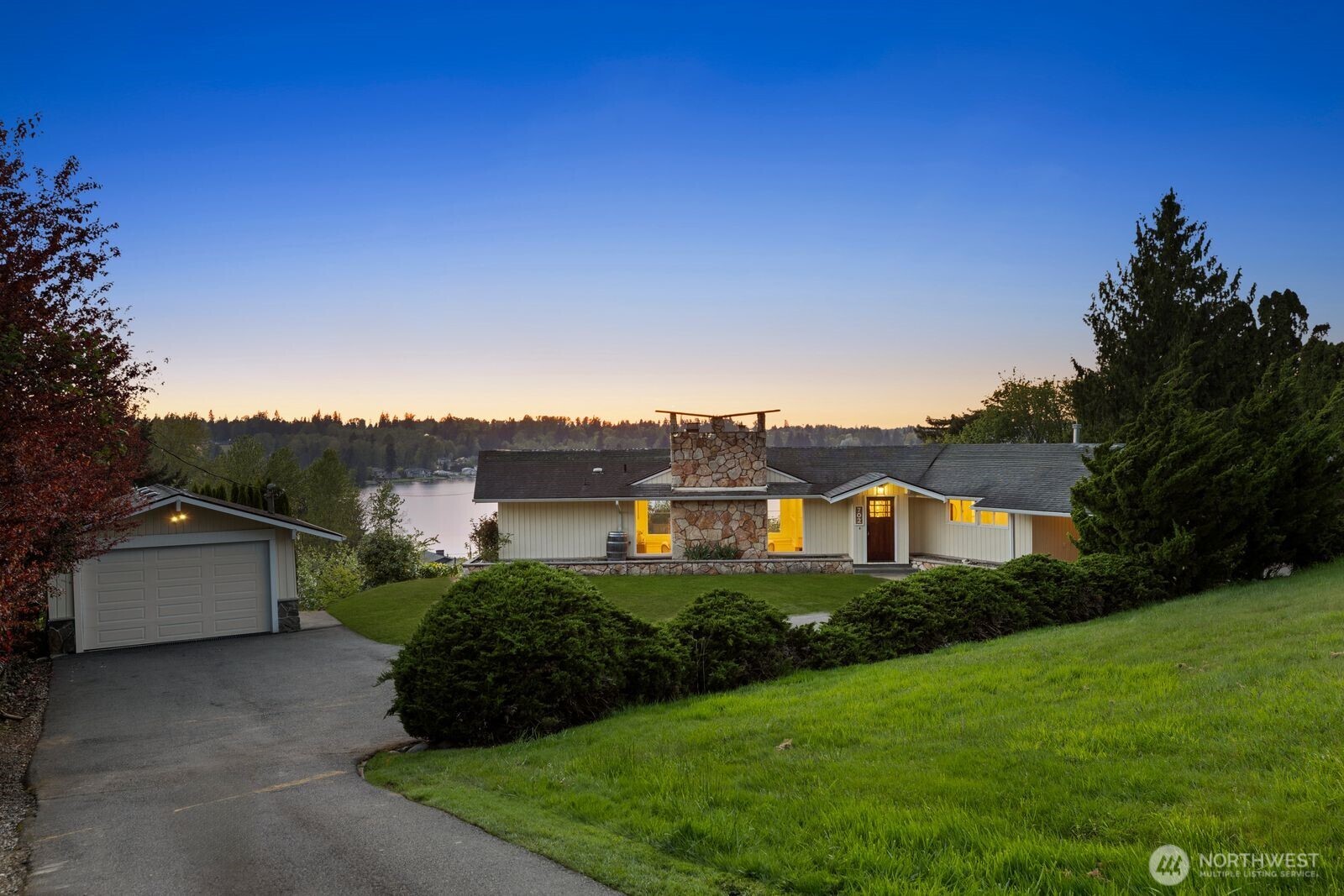 702 Rhodora Heights Road Lake Stevens, WA 98258 - Photo 40 of 40 a view of a house with a yard