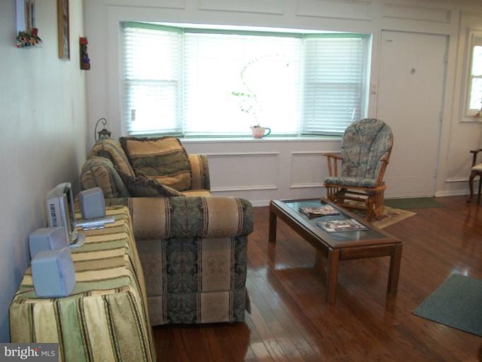 7310 Old Keene Mill Road Springfield, VA 22150 - Photo 26 of 30 a living room with furniture and a window
