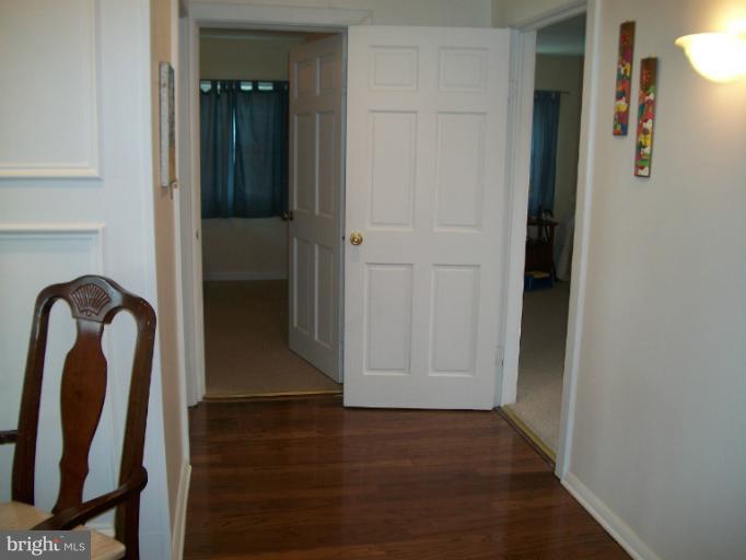 7310 Old Keene Mill Road Springfield, VA 22150 - Photo 29 of 30 a view of front door with wooden floor