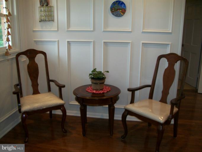 7310 Old Keene Mill Road Springfield, VA 22150 - Photo 30 of 30 a view of a room with furniture and wooden floor