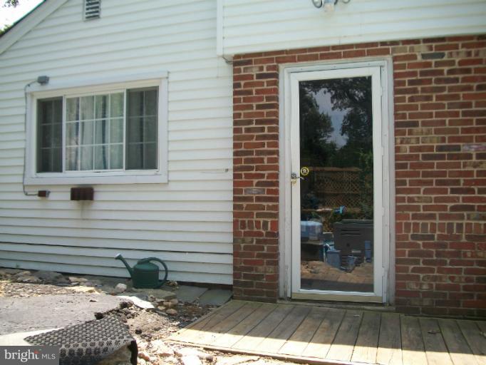 7310 Old Keene Mill Road Springfield, VA 22150 - Photo 4 of 30 a view of a door and a window