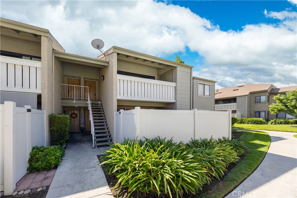 21 Country Mile Road Pomona, CA 91766 - Photo 1 of 18 a front view of a house with garden