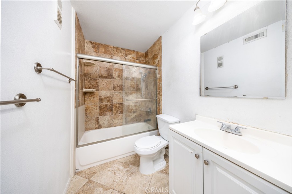 21 Country Mile Road Pomona, CA 91766 - Photo 13 of 18 a bathroom with a sink a toilet and shower