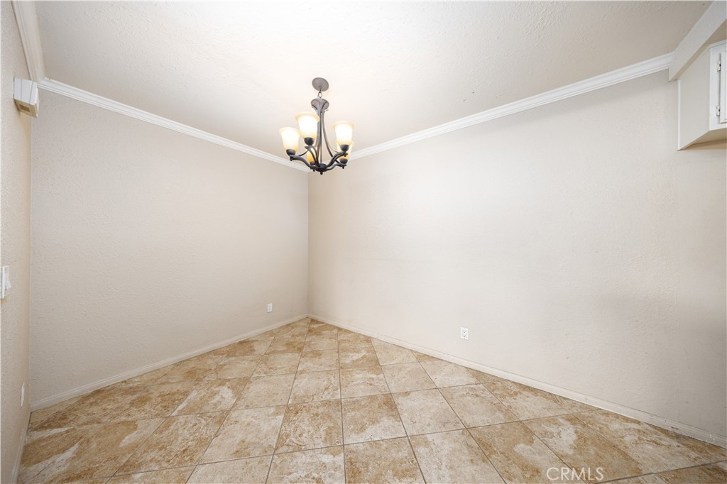 21 Country Mile Road Pomona, CA 91766 - Photo 5 of 18 a view of a room with a sink and chandelier fan