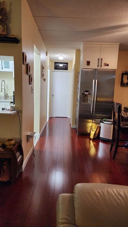 157 Franklin Street, Unit D1 Stoneham, MA 02180 - Photo 9 of 16 a view of a room with gym equipment