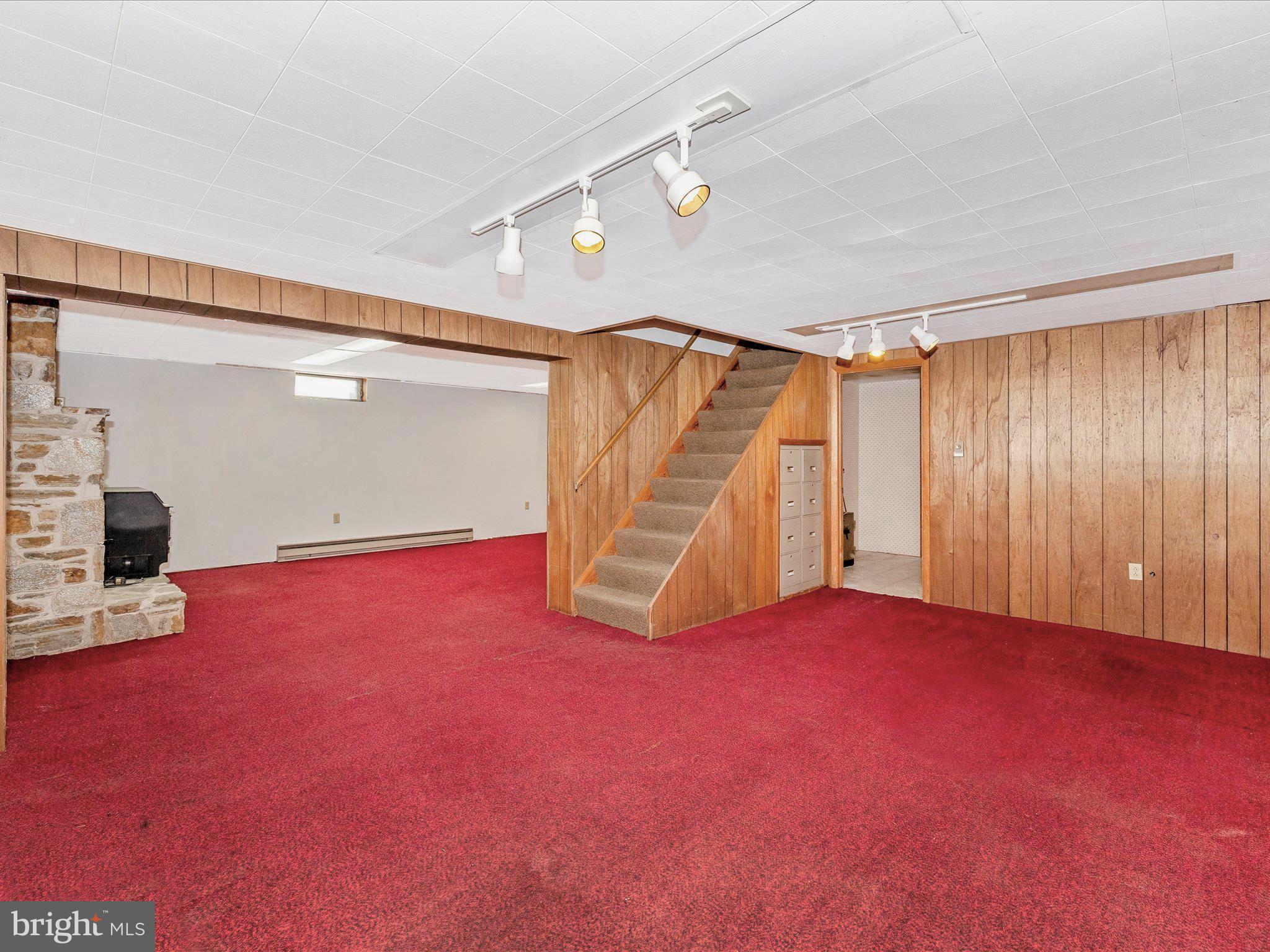 3300 Harney Road Taneytown, MD 21787 - Photo 29 of 37 a view of an empty room with stairs and a window