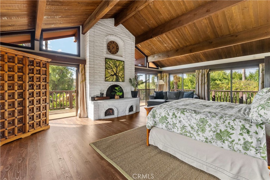 11550 Old Castle Road Valley Center, CA 92082 - Photo 25 of 74 a living room with a bed and furniture with outer view