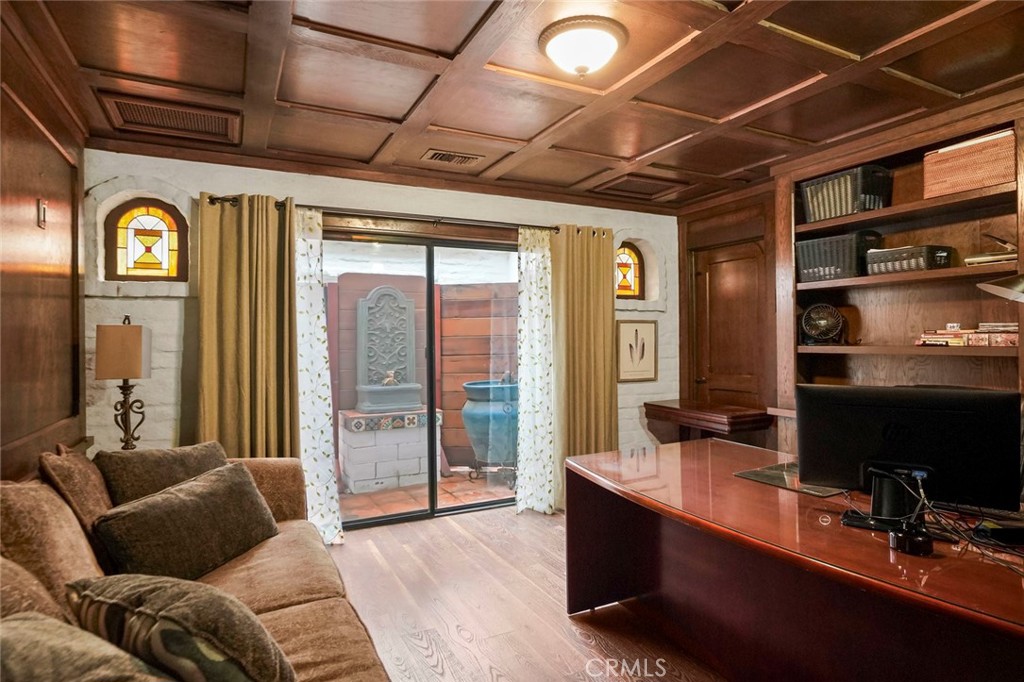 11550 Old Castle Road Valley Center, CA 92082 - Photo 31 of 74 a living room with furniture and a flat screen tv