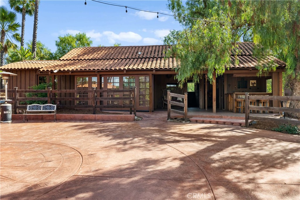 11550 Old Castle Road Valley Center, CA 92082 - Photo 51 of 74 a view of a house with a patio