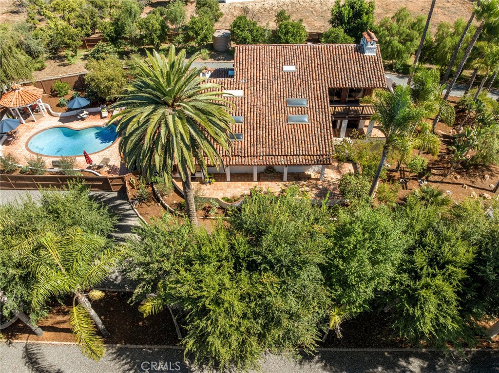 11550 Old Castle Road Valley Center, CA 92082 - Photo 61 of 74 an aerial view of a house with a yard and potted plants