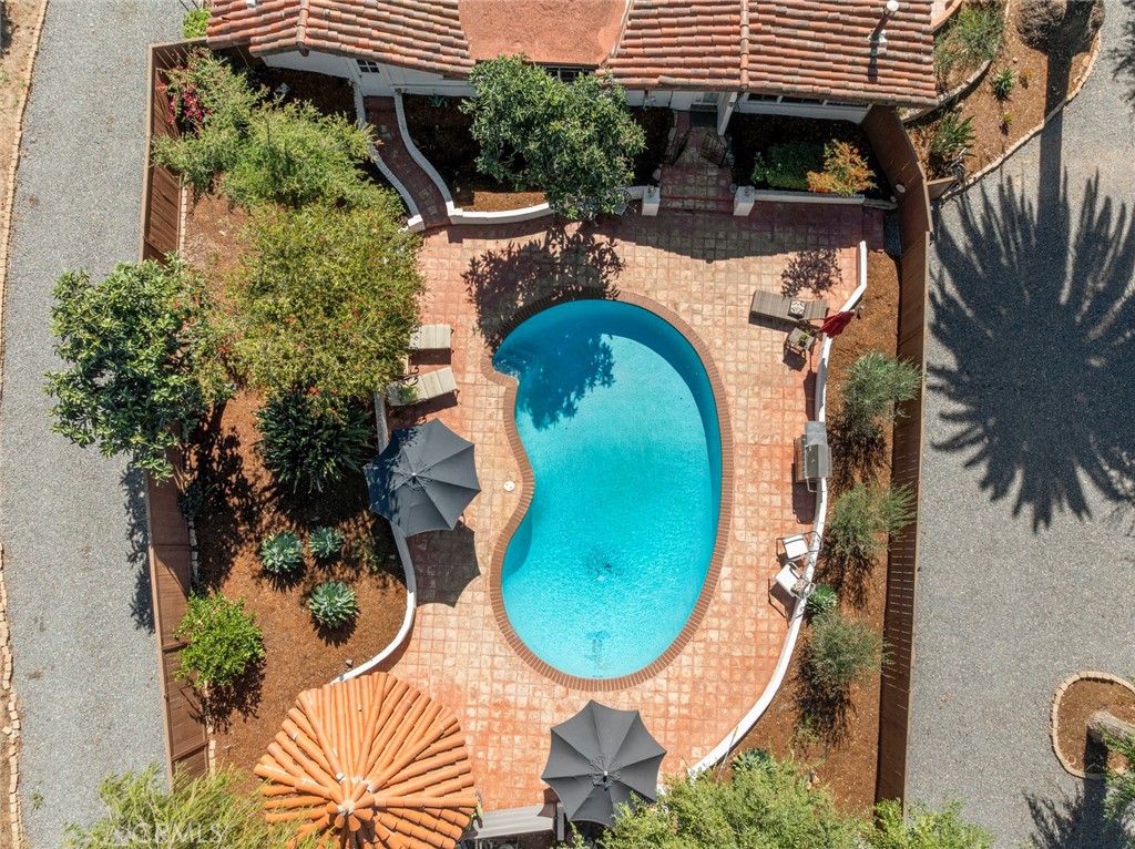 11550 Old Castle Road Valley Center, CA 92082 - Photo 62 of 74 an aerial view of a house with swimming pool and glass doors